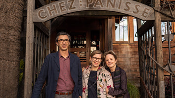 Image of Robin Petravic, Catherine Bailey, and Alice Waters in front of Chez Panisse in Berkeley, CA